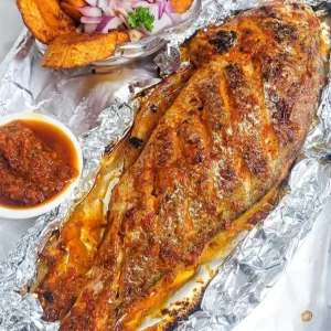 Grilled Catfish Combo (Whole Croaker Fish, Yam Sticks, Plantain & Coleslaw)